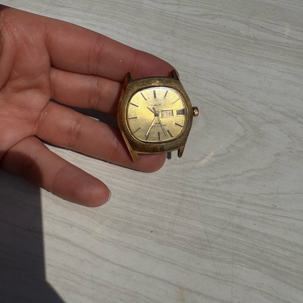 Timex Gold Tone Watch with Day-Date Display